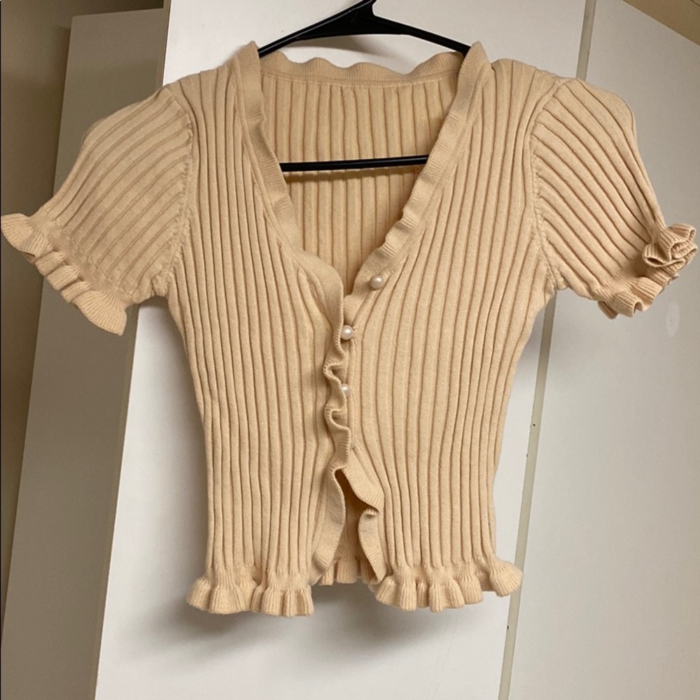 beige top